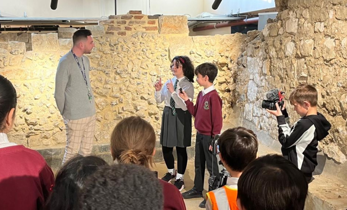 School children interview Dan Cartlidge, Co-Director of Creative Youth